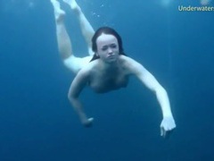 Free Kilo Clips presents: Three ladies get naked swimming in the ocean