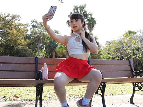 Free Kilo Clips presents: Gorgeous solo college babe doing striptease in a park - pixie