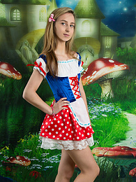FreeKiloClips presents: Very hot blonde teen beauty in an adorable outfit slowly takes it off to reveal her nice and perky boobs