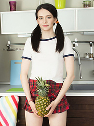 FreeKiloClips presents: Watch this extremely sexy brunette girl as she reveals her beautiful shaved pussy while posing on the floor.