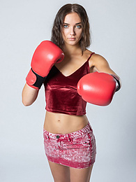 Free Kilo Clips presents: Sexy Ukrainian belle Oxana Chic strips off her clothes and poses nude in a gym