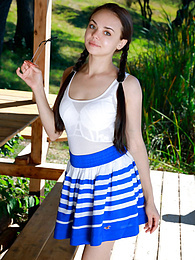 Free Kilo Clips presents: Fresh-Faced russian beauty Mia Grandy gets totally naked on a picnic table in a garden